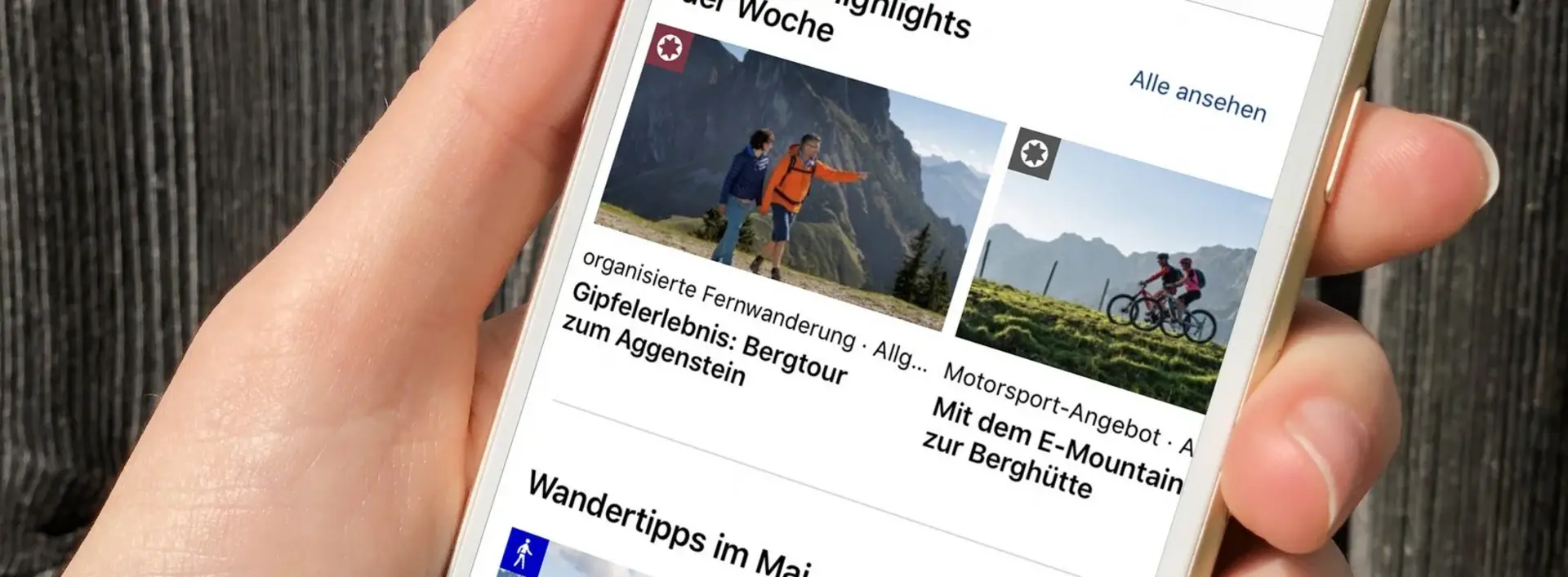 Die Pfronten Outdoor App ist auf dem Smartphone geöffnet.